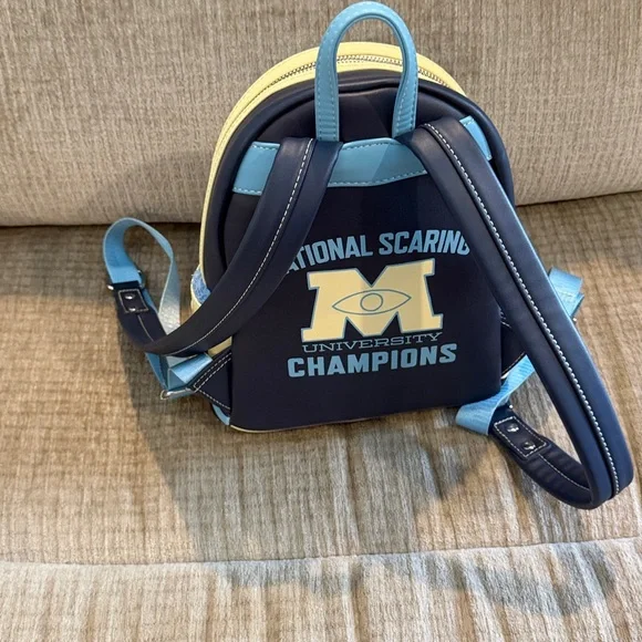 Disney Monsters University varsity jacket Navy and Cream Backpack 10 x 8 - Picture 5 of 10